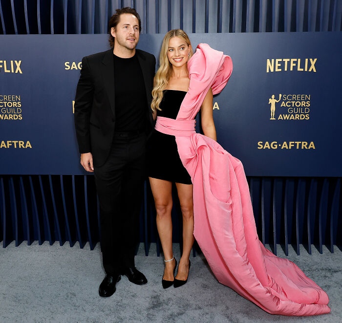 Margot Robbie and partner posing at Screen Actors Guild Awards Margot Robbie and partner posing at Screen Actors Guild Awards