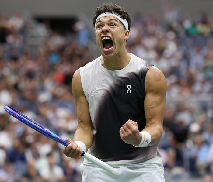 A male tennis player at US Open cheering, a viral sensation