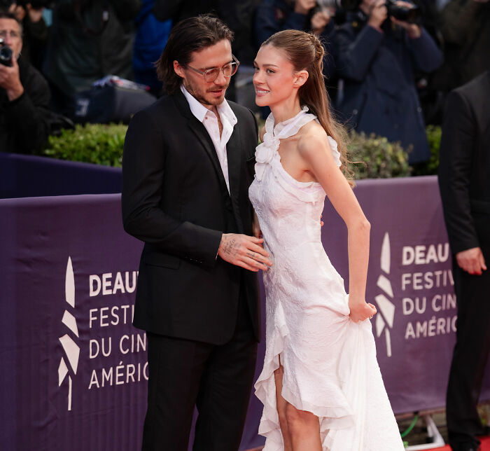 Nicola Peltz and Brooklyn Beckham on the red carpet, sparking questions about their relationship. Nicola Peltz and Brooklyn Beckham on the red carpet, sparking questions about their relationship.