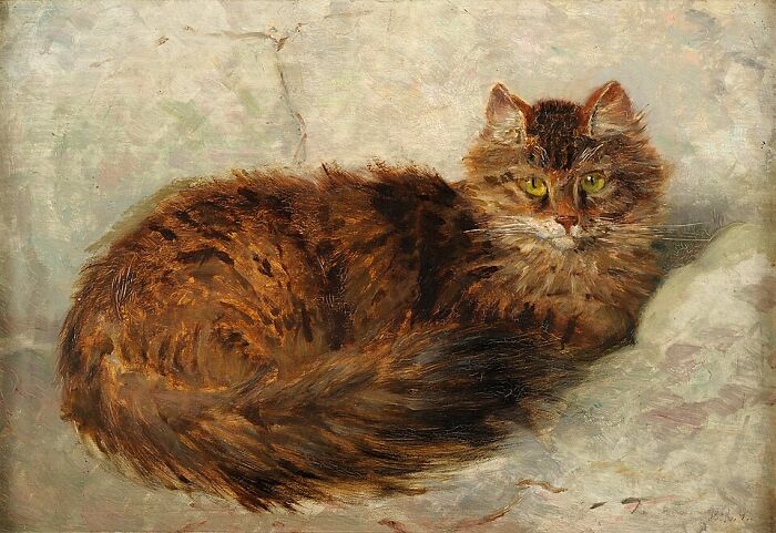 A 19th-century cat painting depicting a brown tabby cat with green eyes lounging. This cat painting exemplifies 19th-century artistry.