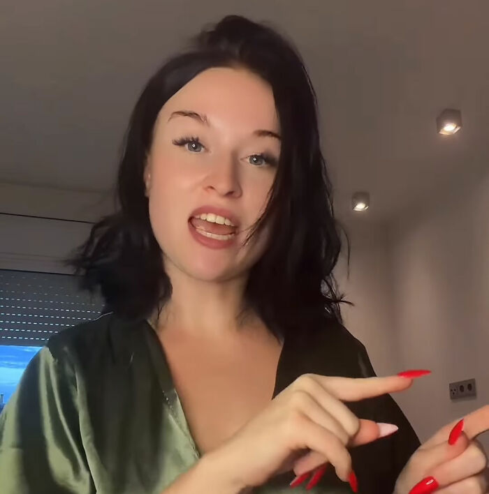 A girl with dark hair and red nails speaks, generating new content for an adult platform. A girl with dark hair and red nails speaks, generating new content for an adult platform.