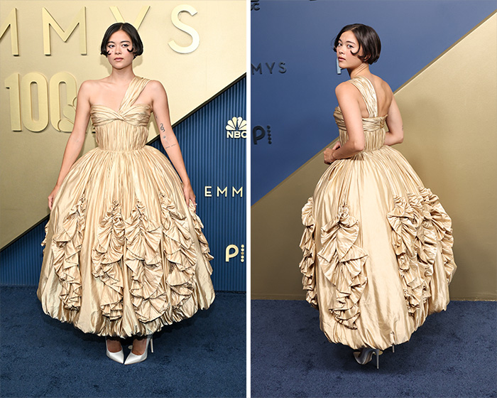 A star in a worst dressed outfit at the 2026 Emmys, in a voluminous, gold, ruched gown with an unusual silhouette.