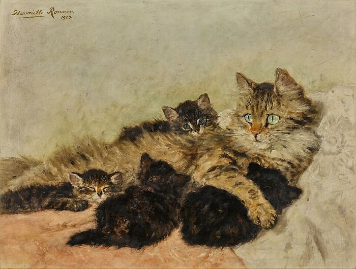 19th century cat painting of a mother cat with her several kittens on a soft surface.