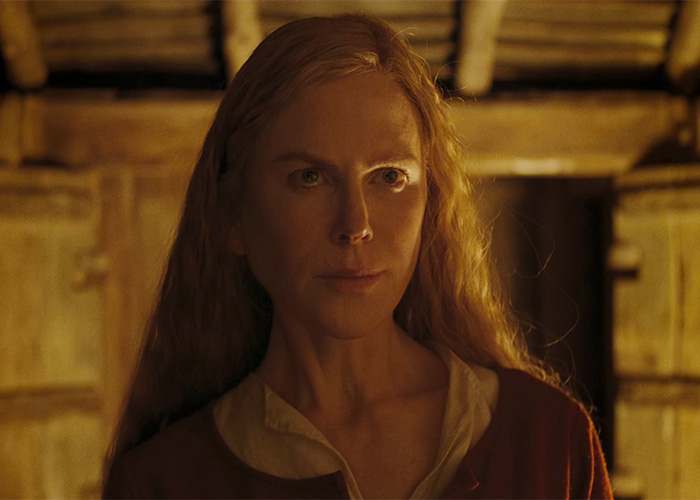 Nicole Kidman in a historical film setting, highlighting Hollywood's plastic surgery obsession.