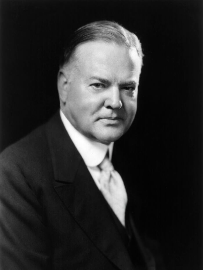 A grayscale photo of a public figure, Herbert Hoover, who destroyed his own legacy.