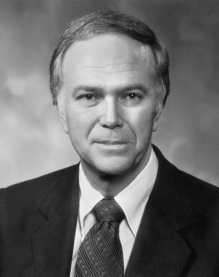 A black and white portrait of a man in a suit, symbolizing public figures destroying their legacies.