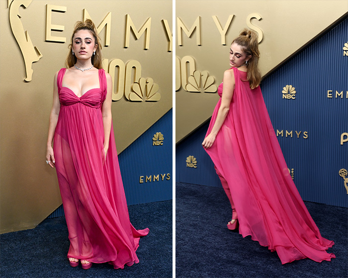 Worst Dressed Stars at the 2026 Emmys: A celebrity in a flowing sheer fuchsia gown with a long train.