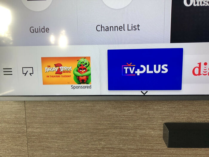 An ad for Angry Birds on a smart TV dashboard, showing a terrible product design with unwanted ads in the UI.