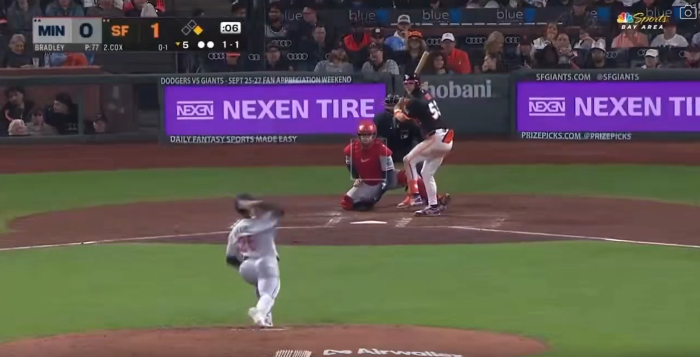 Giants baseball game live pitch showing pitcher and batter action on field