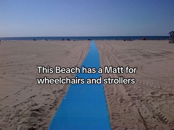 Beach accessibility mat for wheelchairs and strollers on sandy shore