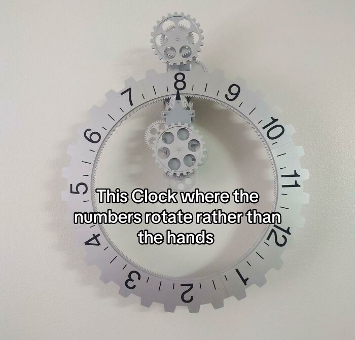 Clock with rotating numbers instead of hands showing clever design