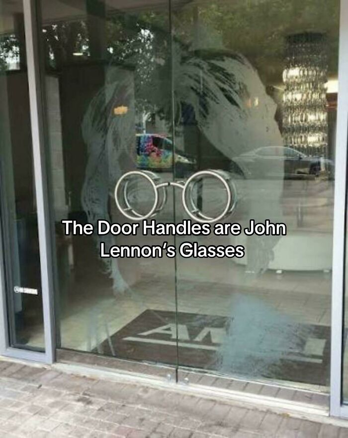Glass door handles shaped like John Lennon's glasses