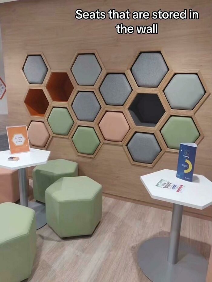 Hexagonal seats that can be stored within the wall for space-saving design