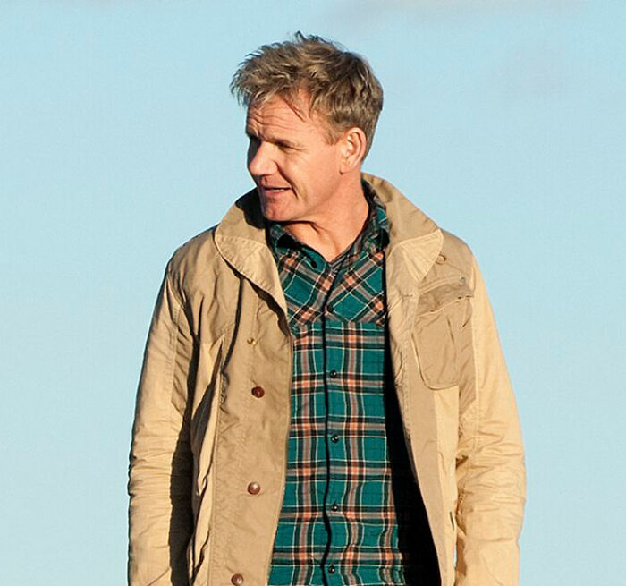 Gordon Ramsay, a celebrity, looks off-camera in a casual jacket and plaid shirt, representing brutal hot takes.