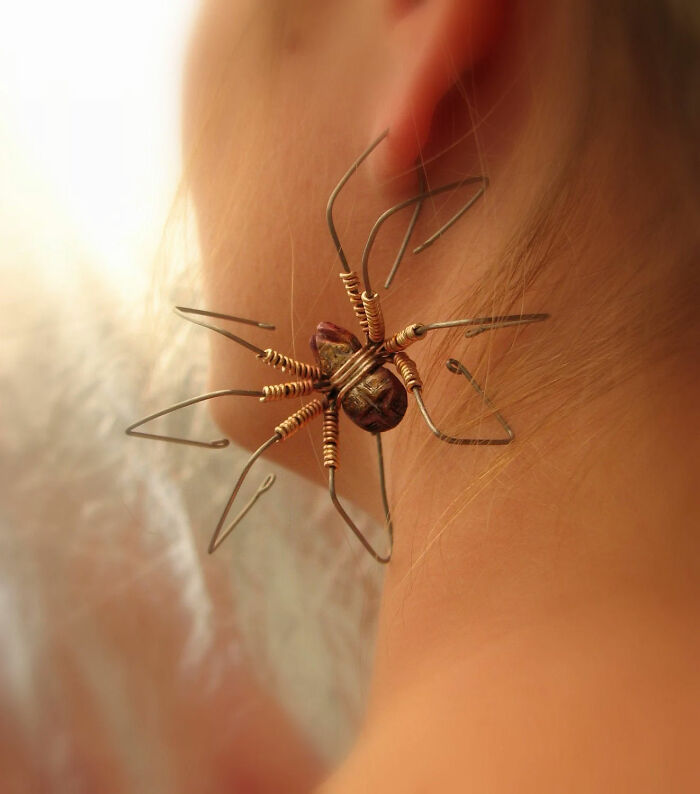 Unique spider-shaped wire earrings showcasing craftsmanship