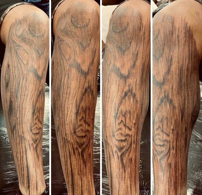 Flawless craftsmanship realistic wood grain tattoo on leg