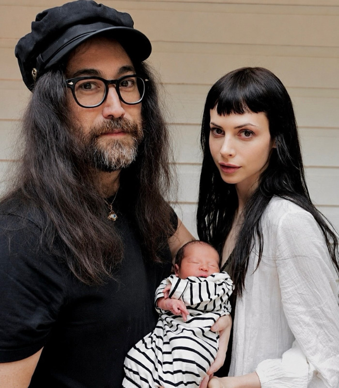 Sean Ono Lennon, his partner, and their newborn, John Lennon's grandson, with an unusual name. Sean Ono Lennon, his partner, and their newborn, John Lennon's grandson, with an unusual name.