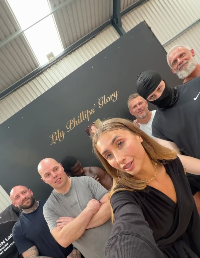 Lily Phillips and men posing for an adult industry stunt, viewers fixated on the detail. Lily Phillips and men posing for an adult industry stunt, viewers fixated on the detail.