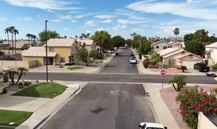 An aerial view of a suburban neighborhood where an HOA seized a man's $450K home for a small debt.