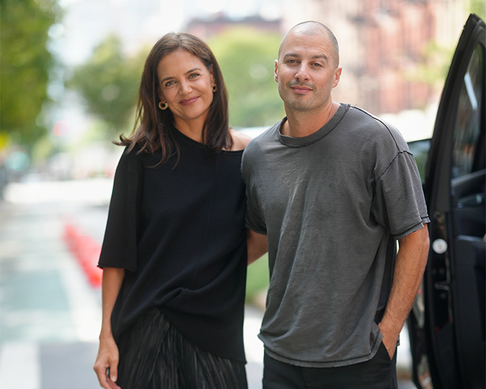 Katie Holmes with her new boyfriend smiling together, after her daughter challenges Tom Cruise with a name change. Katie Holmes with her new boyfriend smiling together, after her daughter challenges Tom Cruise with a name change.