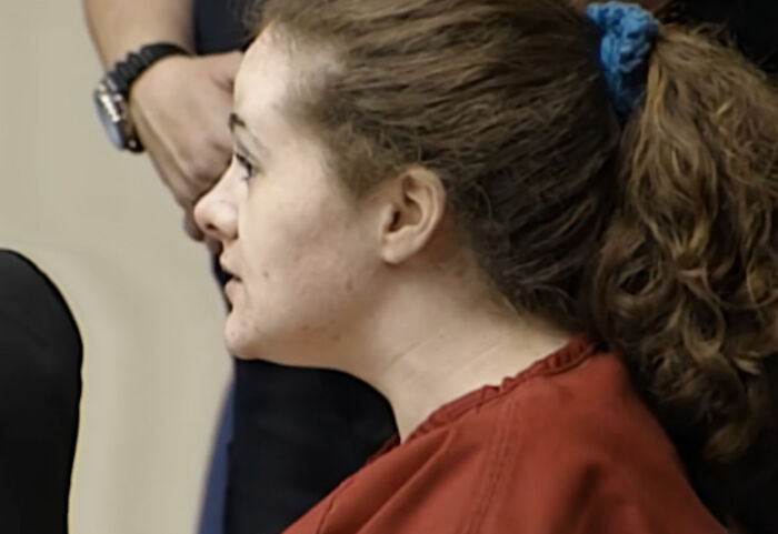 Christa Pike in orange prison scrubs during a trial for horrific crimes in Tennessee Christa Pike in orange prison scrubs during a trial for horrific crimes in Tennessee
