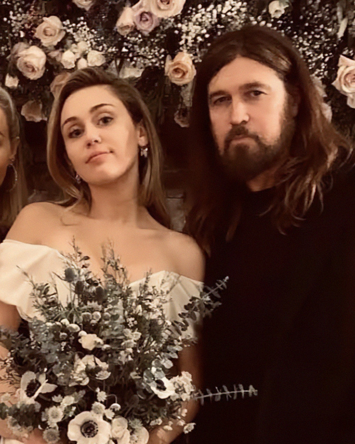 Miley Cyrus and Tish Cyrus at a wedding, sparking fury after Dolly Parton passing with a big announcement