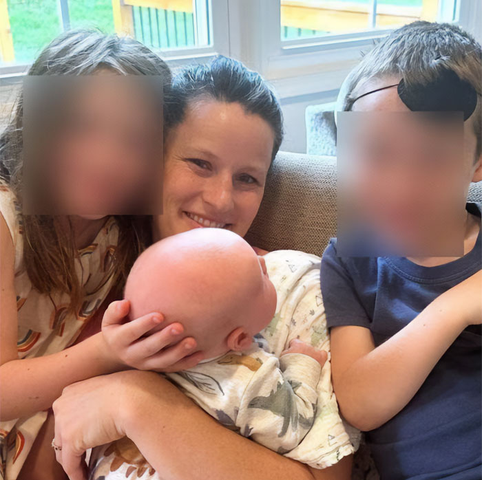Mom smiles with her 5-year-old son and two other children. Mom sentenced for naive act, promises to fight back. Mom smiles with her 5-year-old son and two other children. Mom sentenced for naive act, promises to fight back.