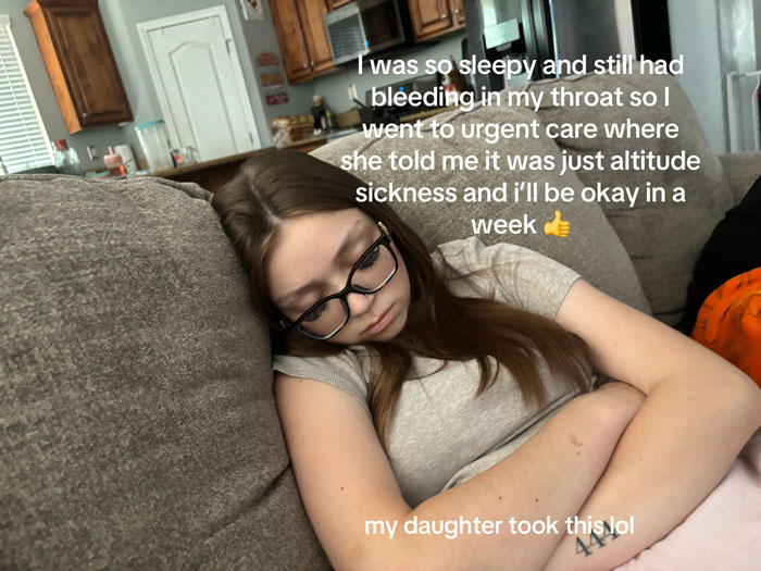 A young woman in glasses, asleep on a couch, with overlaid text about her altitude sickness and rare cancer. A young woman in glasses, asleep on a couch, with overlaid text about her altitude sickness and rare cancer.