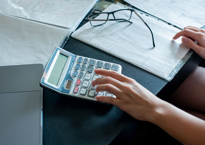 A divorced person calculating financial assets during a marriage separation