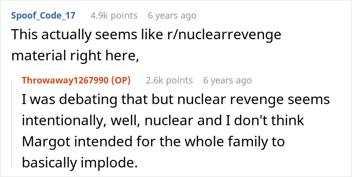 A screenshot showing a Reddit thread discussing nuclear revenge after dogs attack woman's cat. A screenshot showing a Reddit thread discussing nuclear revenge after dogs attack woman's cat.