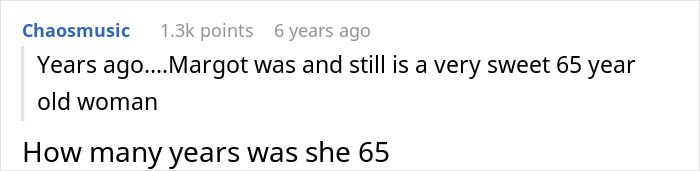 A Reddit comment screenshot wondering about the age of a woman whose dogs attacked a cat. A Reddit comment screenshot wondering about the age of a woman whose dogs attacked a cat.