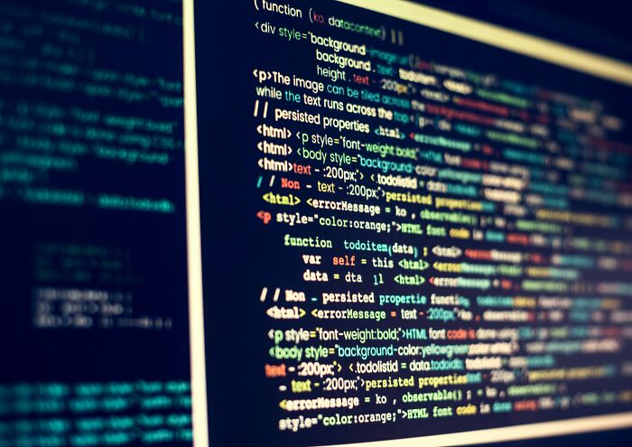 Computer screen displaying lines of code, symbolizing the shocking industry secrets of technology professionals.