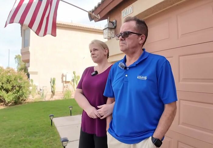 A man and woman standing outside a house, representing the homeowners whose $450K home was seized by the HOA.