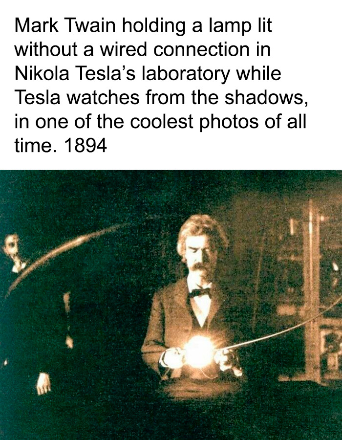 Historical photo of Mark Twain and Nikola Tesla in a lab, an example of remarkable photos of the past.