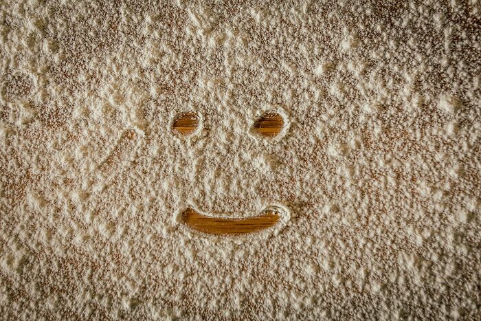 A smiley face drawn in flour, a common kitchen sight that can hide dirty truths from regular people.