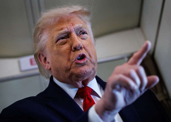Donald Trump, with an animated expression, points his finger, revealing brutal words to Marine One pilots by a lip reader. Donald Trump, with an animated expression, points his finger, revealing brutal words to Marine One pilots by a lip reader.