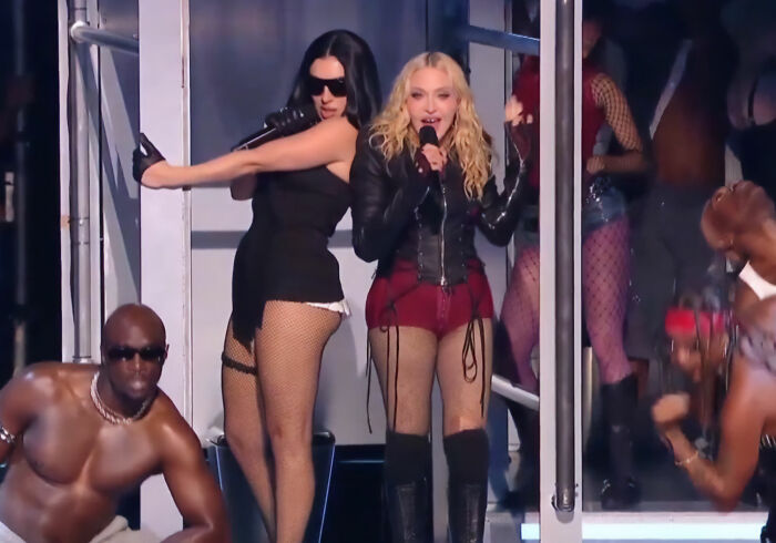 Madonna performing live on stage during her controversial VMAs performance. Madonna performing live on stage during her controversial VMAs performance.