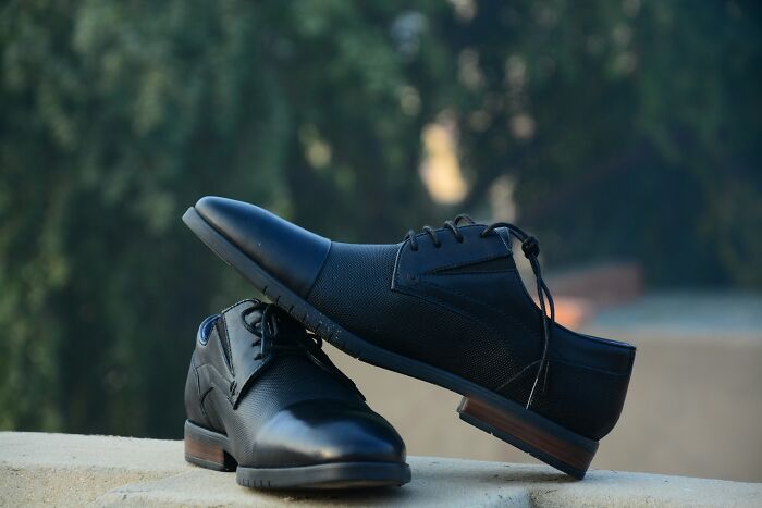 A pair of black formal shoes, symbolizing split and divorce division of property