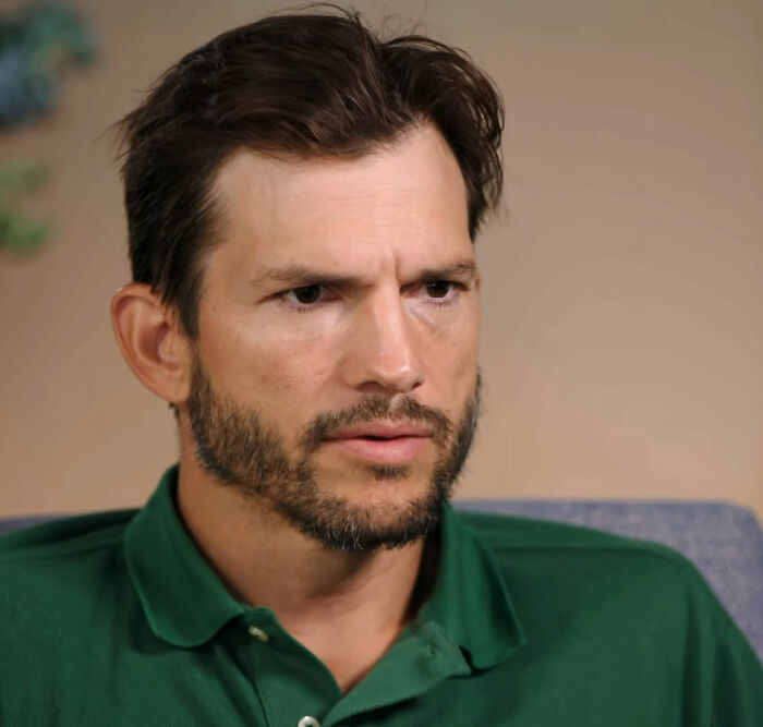 Ashton Kutcher, a public figure, discusses his destroyed legacy in a pensive moment during an interview.