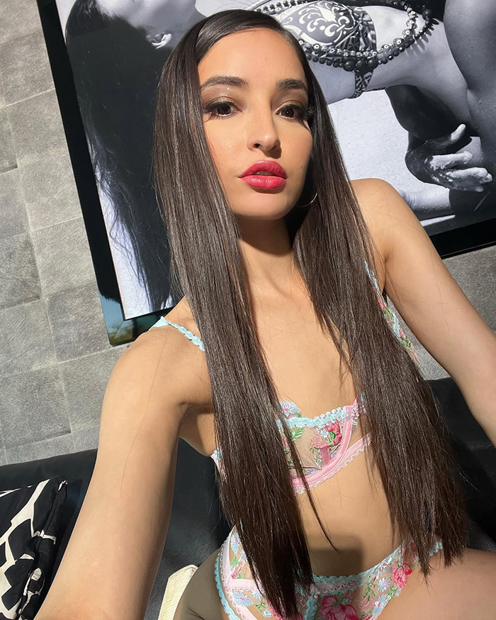 Emily Willis, the paralyzed actress, in a selfie, wearing pink and blue lingerie, her family reveals her conscious locked-in state.