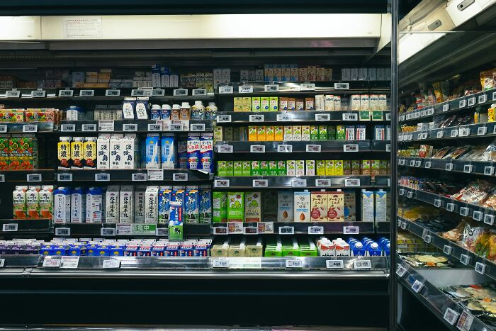 A supermarket aisle with various products, symbolizing everyday secrets that came to light after people were gone.