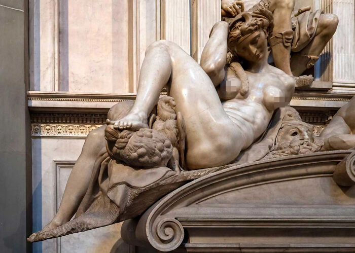 Strange famous painting of a reclining marble statue of a woman, partially covered, atop an elaborate tomb.
