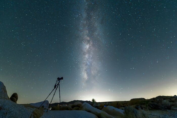 A camera captures the Milky Way galaxy, emphasizing the vastness of the cosmos and the spherical Earth. A camera captures the Milky Way galaxy, emphasizing the vastness of the cosmos and the spherical Earth.