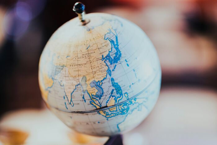 A close-up view of a globe, highlighting the Earth is not flat. A close-up view of a globe, highlighting the Earth is not flat.