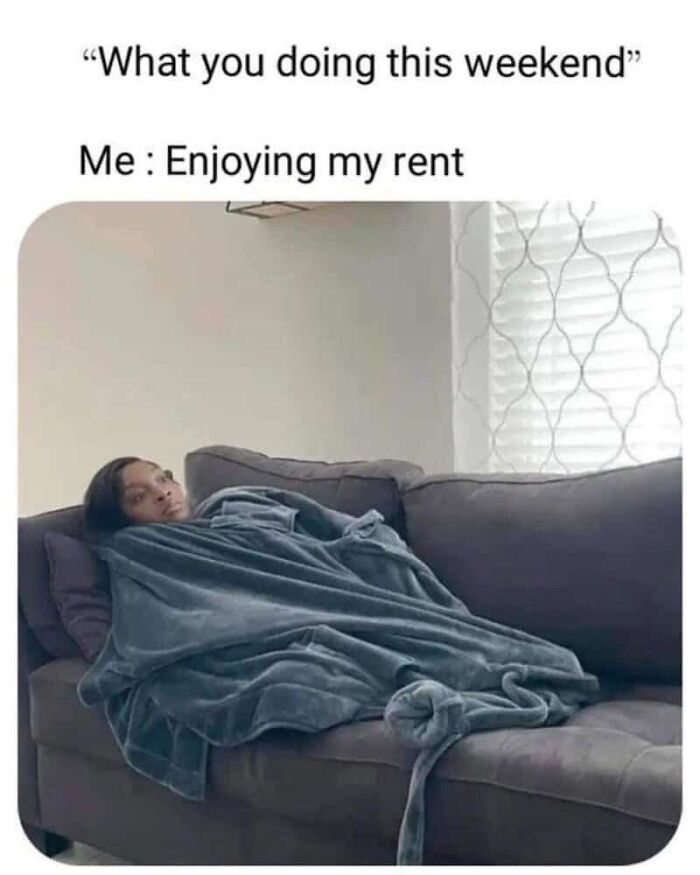 A relatable meme for adults showing a person wrapped in a blanket on a couch, enjoying their rent.