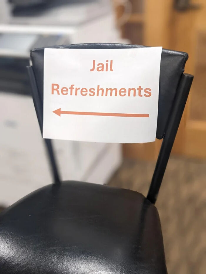 A handwritten sign on a chair reading Jail Refreshments, showing funny mistakes on signs
