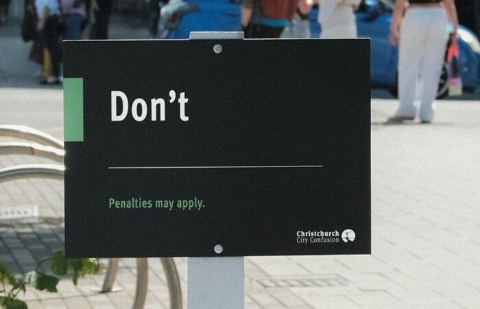 A black public sign that simply reads Don't, illustrating funny mistakes on signs