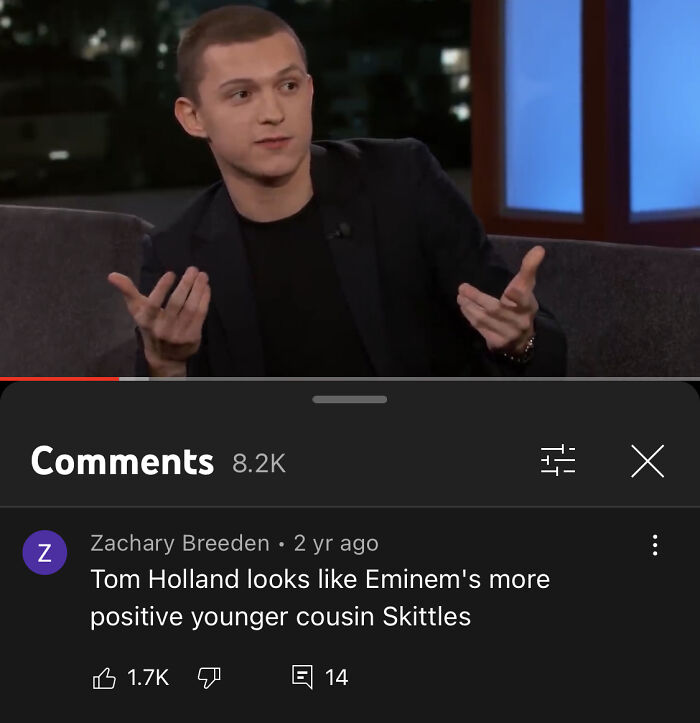 Tom Holland speaking on a talk show, with a funny YouTube comment about his appearance in the comment section.