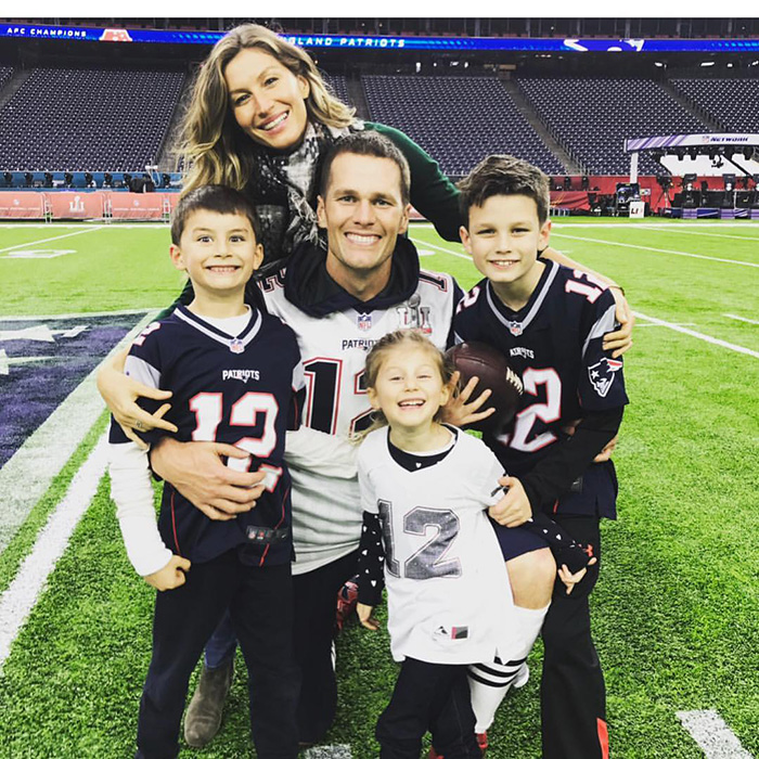 Gisele Bündchen and Tom Brady with their children on football field Gisele Bündchen and Tom Brady with their children on football field