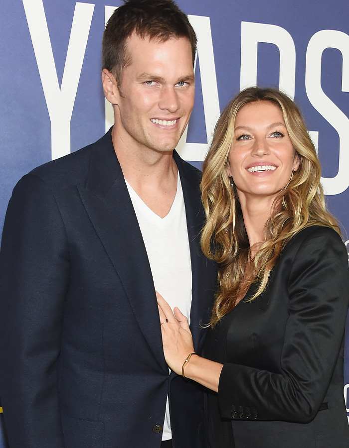 Gisele Bündchen and Tom Brady posing together on red carpet Gisele Bündchen and Tom Brady posing together on red carpet